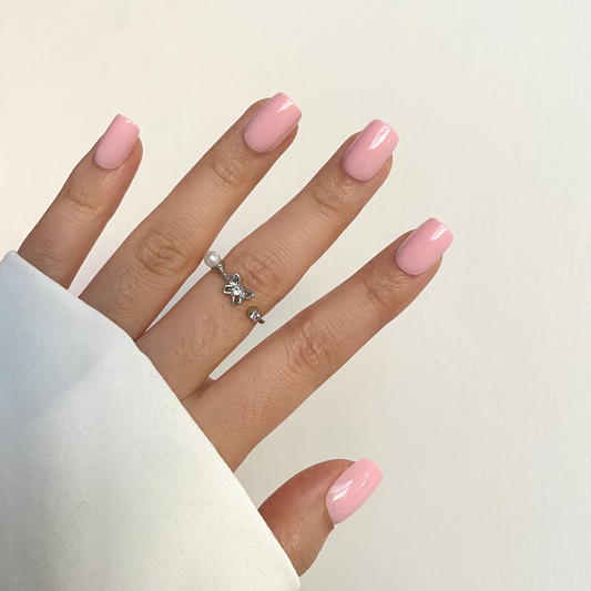 Licht roze sugary press-ons in square vorm van BIMA Nails